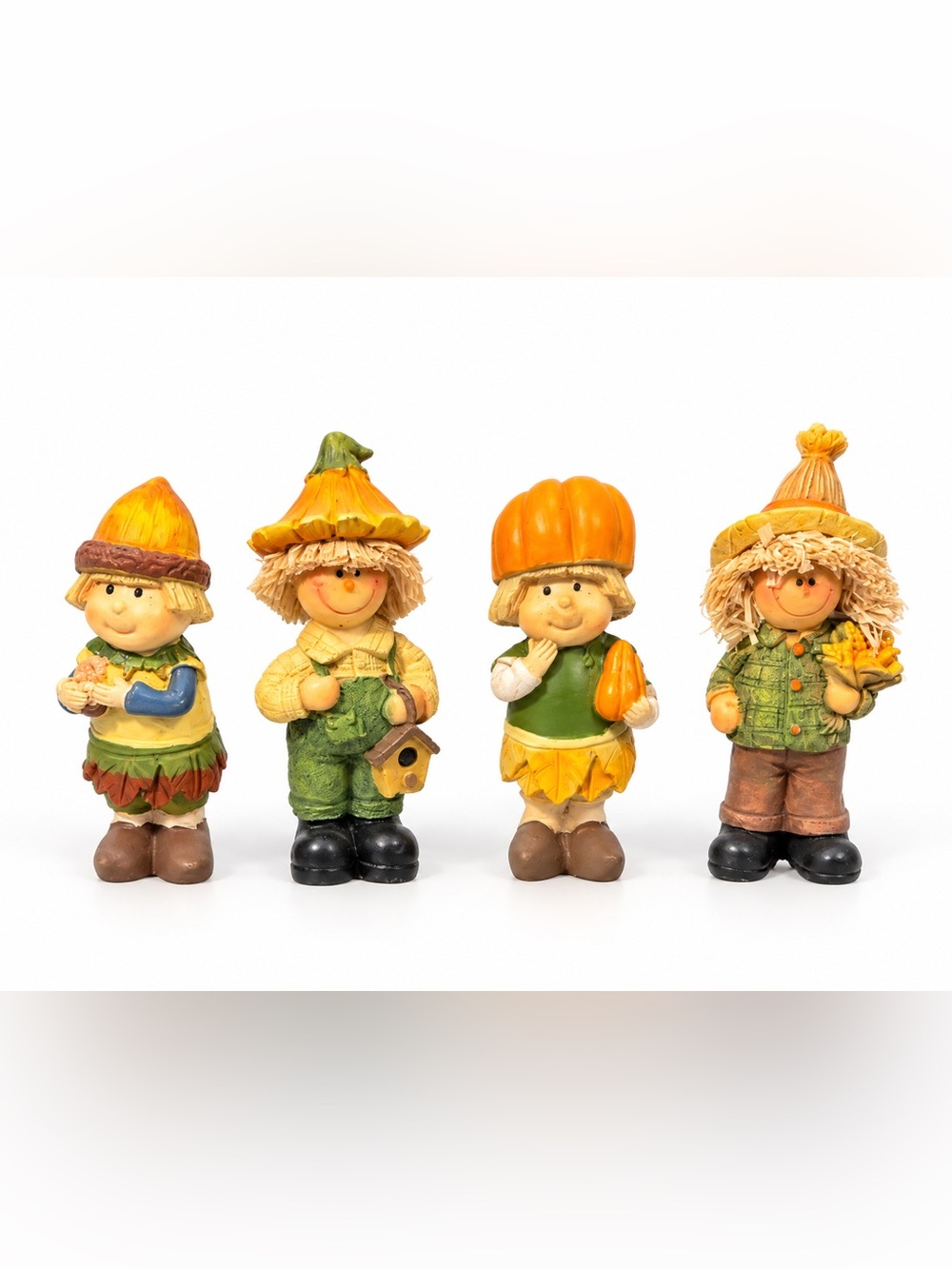 Set of 4 resin scarecrow and fall figurines